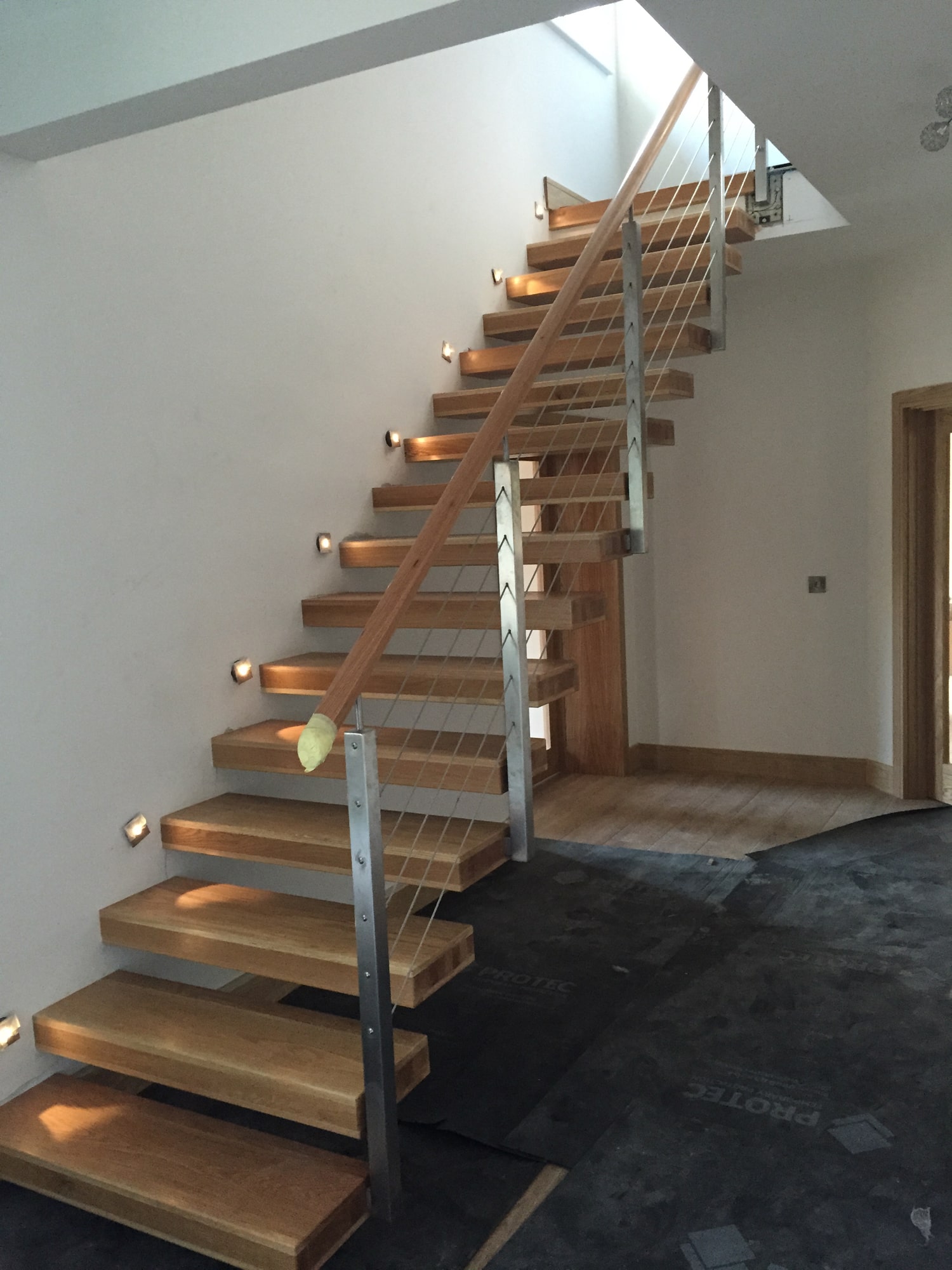 Architectural - SX Engineering - Floating stairs 2 ss wire rope balustrade